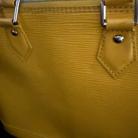 Used excellent condition Louis Vuitton Epi Alma BB with strap - Picture 12 of 16